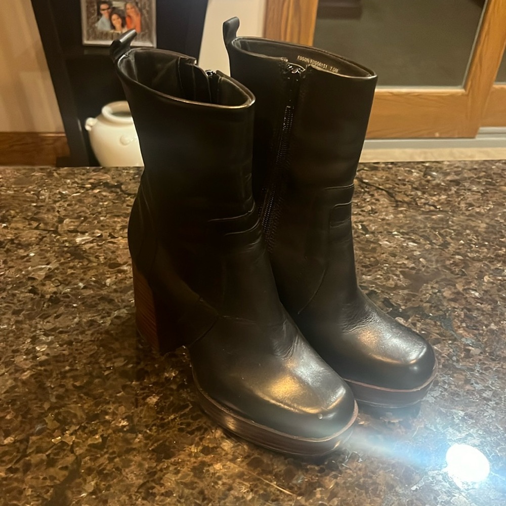 Steve Madden black leather boots with wooden heel. Size 7 1/2 worn once.
